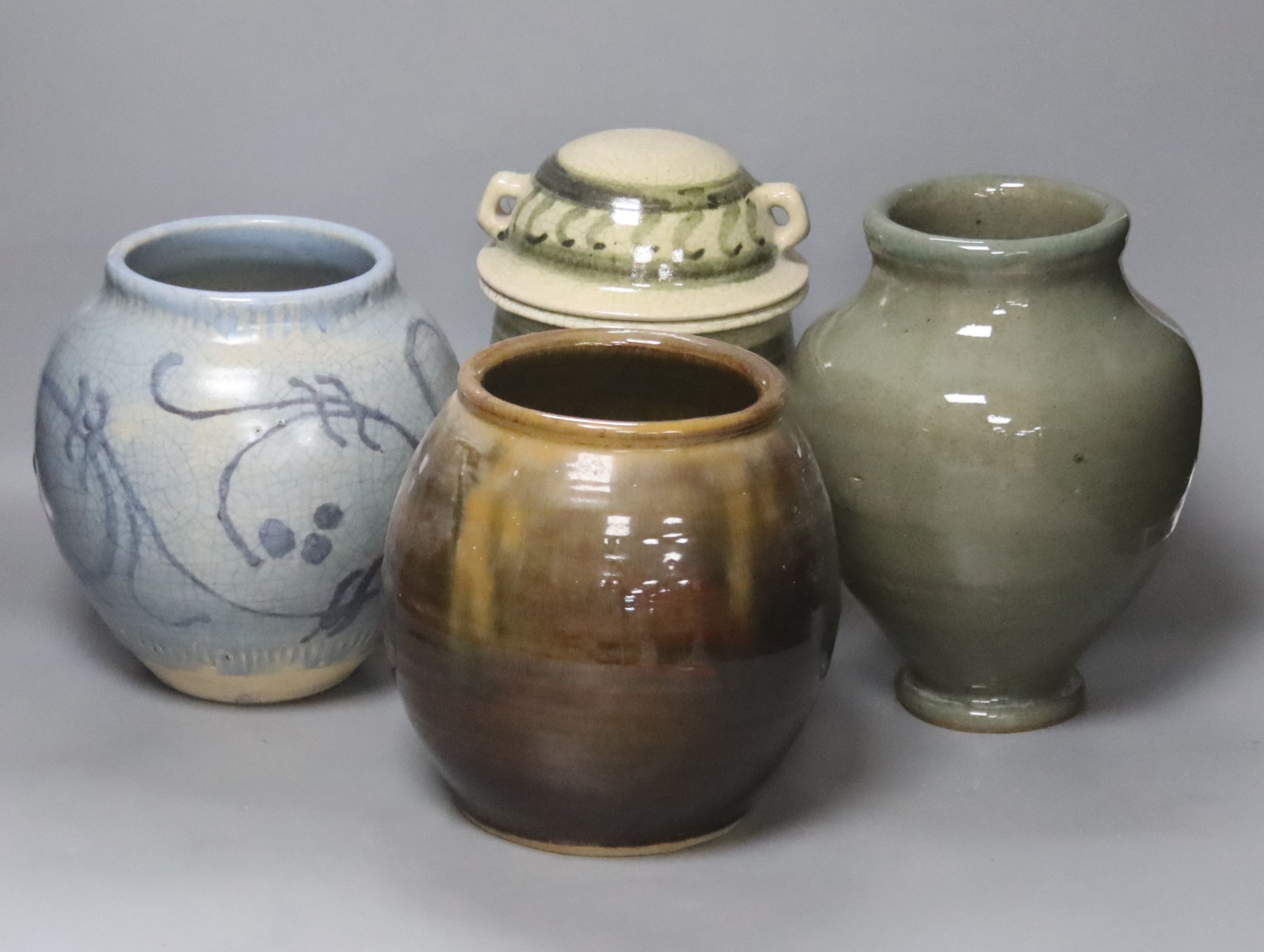 Andrew Rudebeck. A studio glass jar and cover, 22cm, and three further studio pottery jars